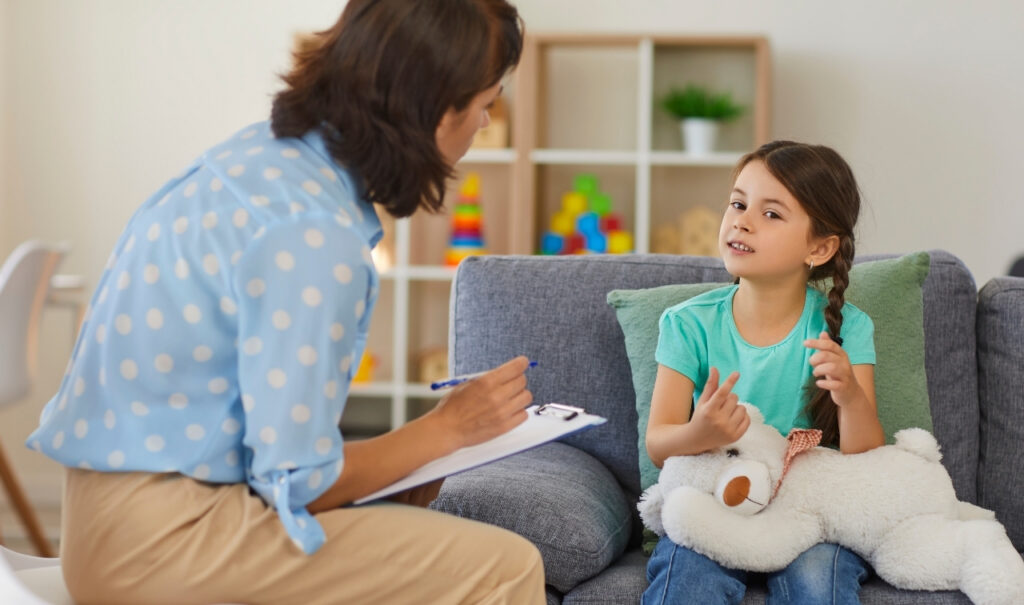 Child therapist in session with a child